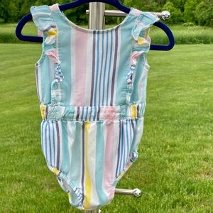 Carter’s: Baby girl romper in pastel vertical stripes.  6 months.